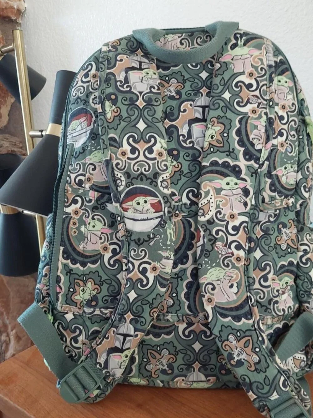 Vera Bradley Star Wars Grogu medallion backpack with repeating cartoon character